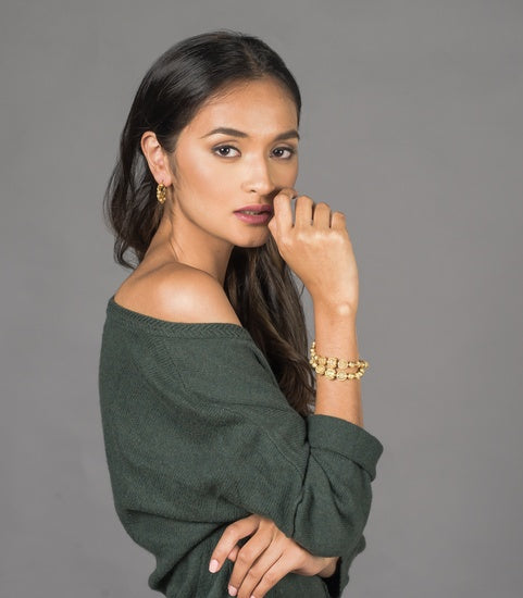 Amami Tambourine Bracelet on a model